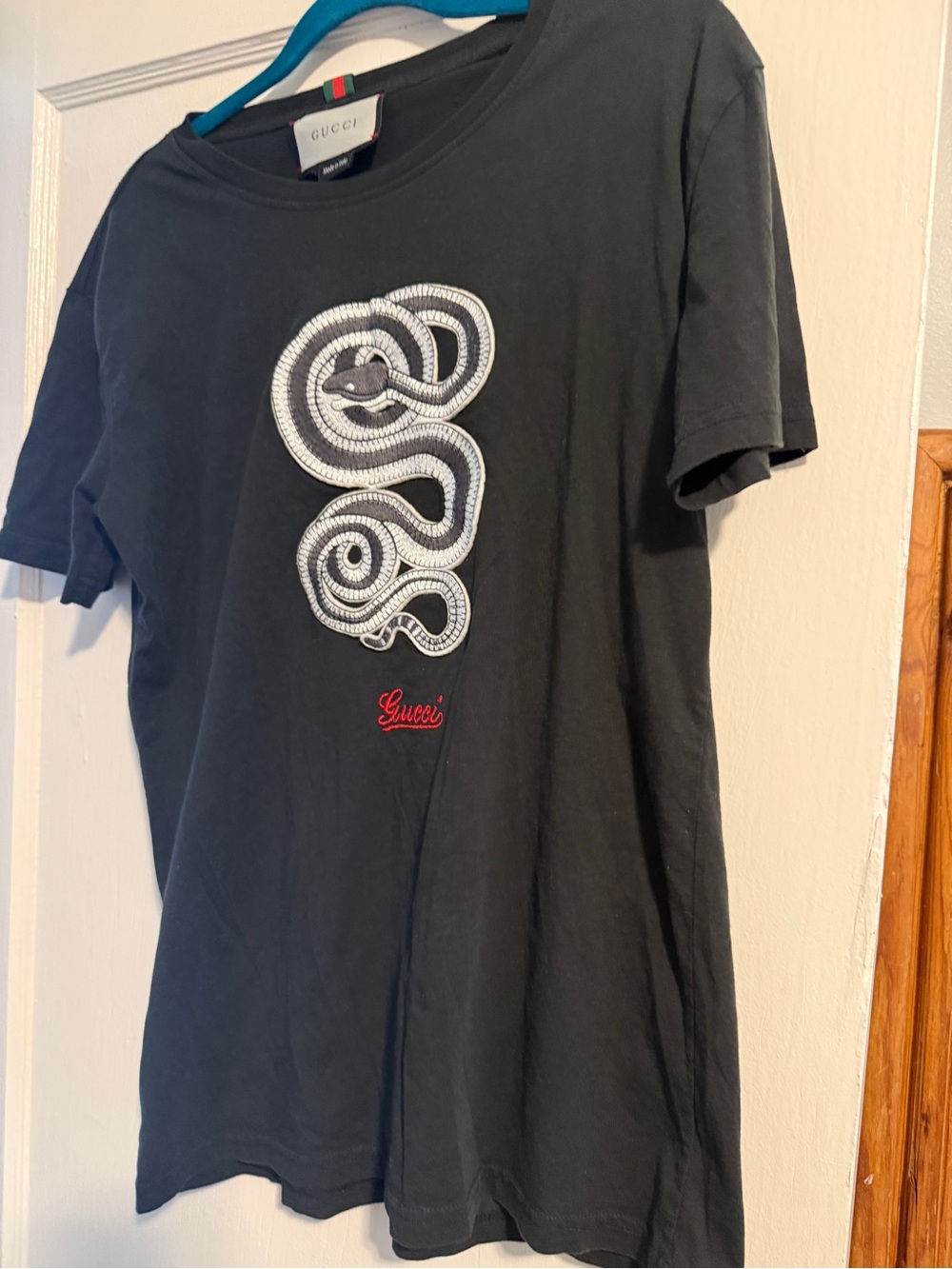 Gucci Black Tee with White Snake Motif and Red Script